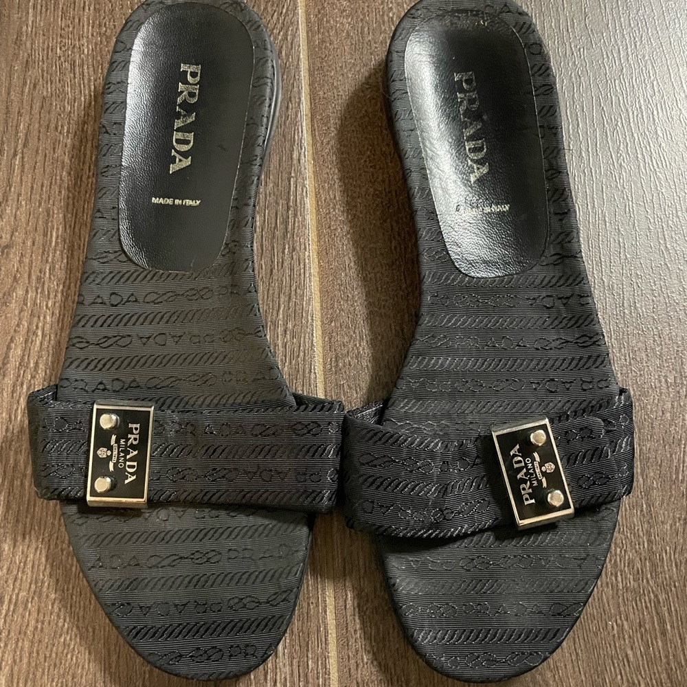 PRADA slides. Size 39 1/2. Black with silver hardware. Good condition.